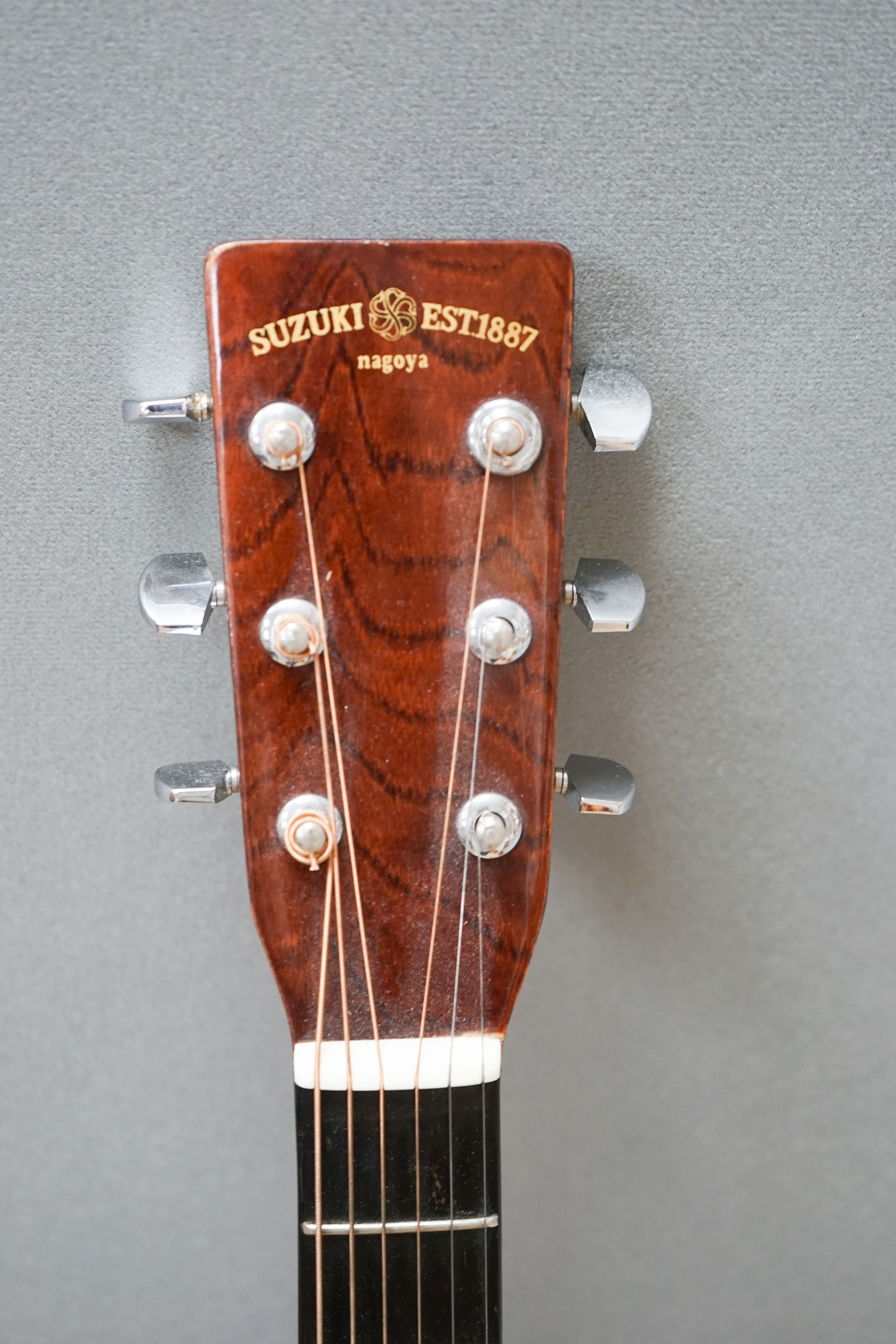 A Suzuki steel string acoustic guitar model???